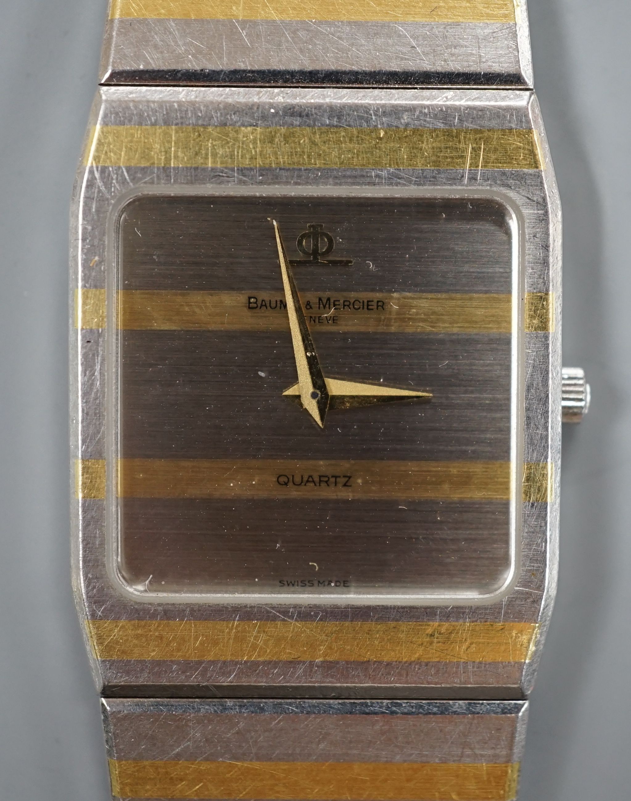 A gentleman's Baume & Mercier steel and gold quartz wristwatch, 20cm